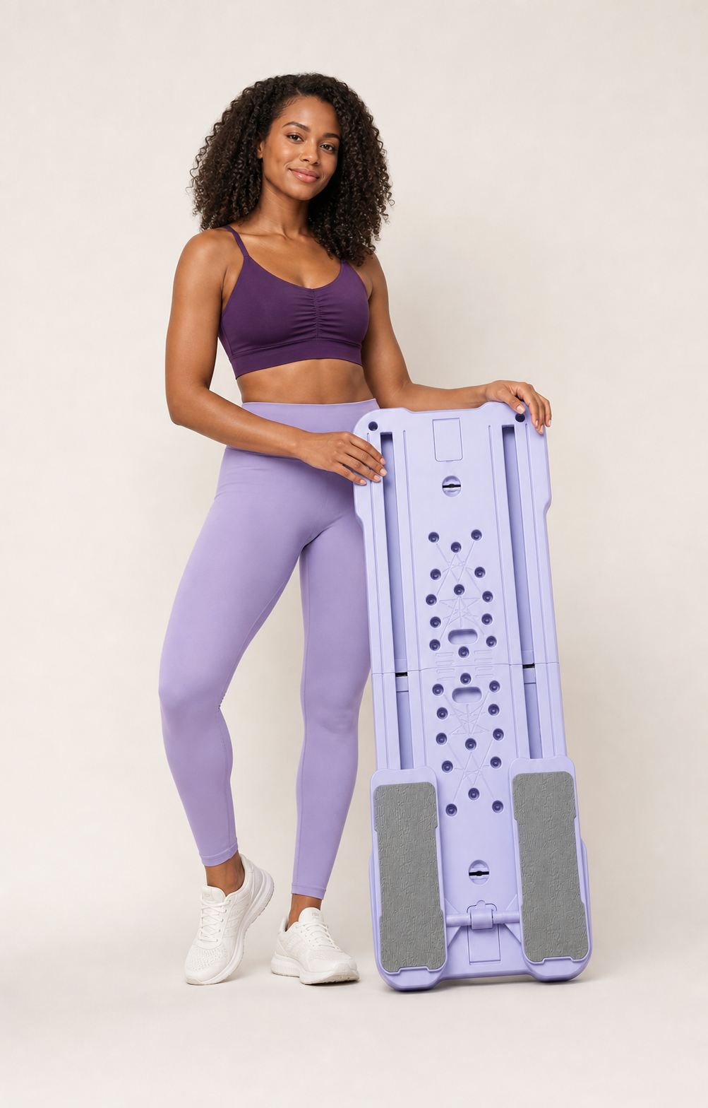 Athlete presenting the Lavender Split Pilates Ab Board